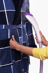 To steam clothes, garment steamer