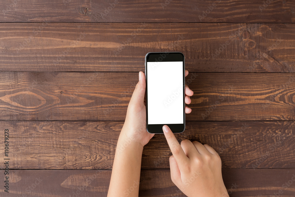 Aufkleber hand using phone blank screen on top view angle