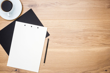 Table with coffee and paper