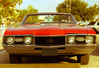 Classic red American convertible car - obrazy, fototapety, plakaty