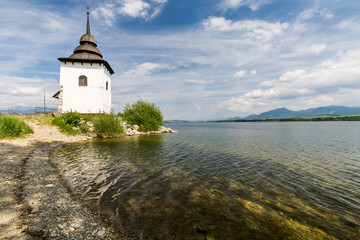 Fototapeta na wymiar Gothic church Havranok at Lake Liptovska Mara, Slovakia