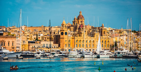 beautiful view on Birgu and the harbour with colorful boats in Malta