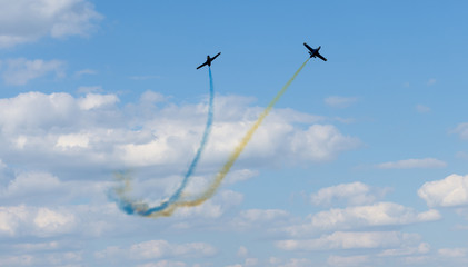 planes performing colorful trails at Kharkiv airshow