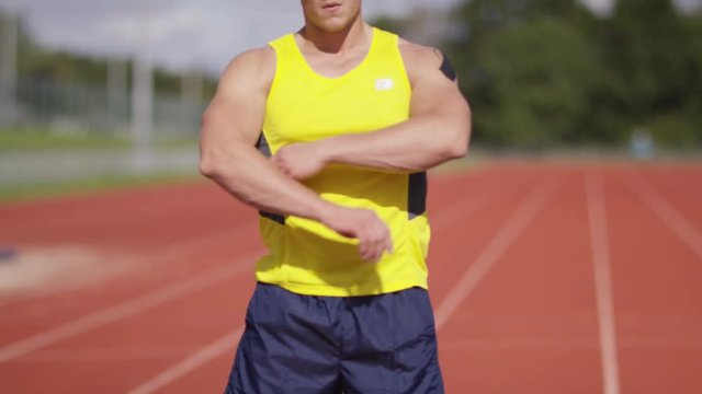  Portrait of serious disabled athlete with prosthetic leg 