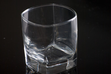 Whiskey Glass - Scotch Glass with background and shinny reflection on bottom