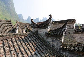 Traditional Chinese Old House Roof at Yucun, Yangshuo, Guilin, China. Built in the Ming and Qing dynasties, Yucun Village in Xingping Town has a history of nearly 500 years.