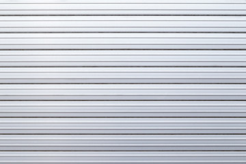 Security roller door or garage door background - corrugated metal sheet.