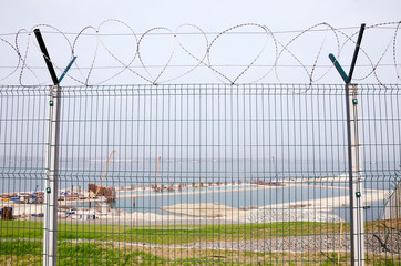 The fence on the construction of the bridge Kerch