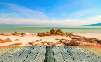 Fototapeta premium Beautiful beach of south of Thailand with wooden under for put your products.