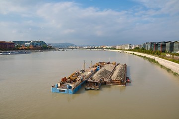 Naklejka premium Barges with construction material