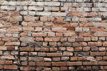 Texture brick wall is weathered and have corrosive.