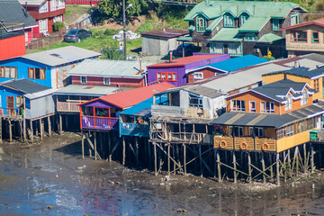 Fototapeta na wymiar Palafitos (stilt houses) in Castro, Chiloe island, Chile