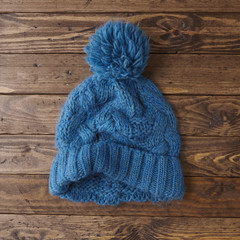 Fototapeta na wymiar Knitted bobble hat