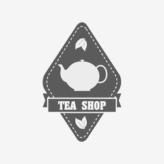 Tea shop badge, label or logo design template with tea pot and tea leaves