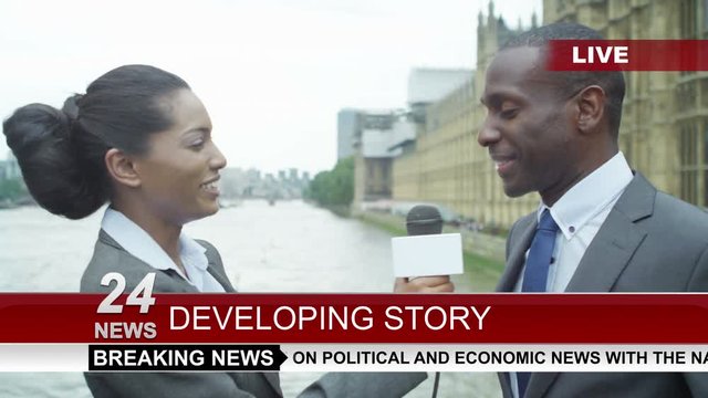  News reporter interviewing businessman or politician in city of London