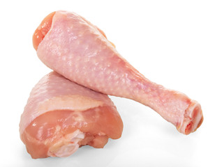Raw chicken legs isolated on white.
