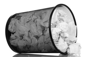 Frustrate metal bucket with paper waste isolated on white.