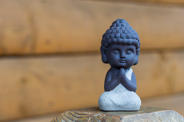 Little Buddha statue image used as amulets of Buddhism religion. Meditation concept with empty...