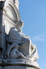 Statue of a Woman with Children at the Victoria Memorial outside