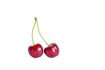 Two berries of sweet cherry on a white background