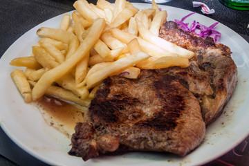 Argentinian steak in a restaurant in Mendoza, Argentina