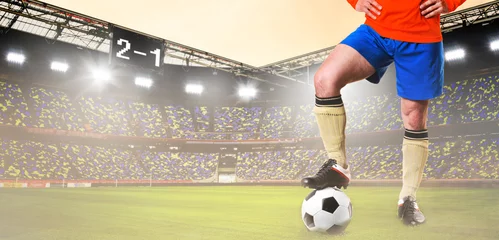 Keuken foto achterwand Voetbal soccer or football player is standing on stadium