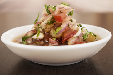 Traditional bowl of ecuadorian encebolladas, very nice presentation, restaurant catering concept