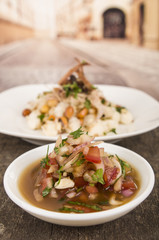 Traditional bowl of ecuadorian encebolladas, very nice presentation, restaurant catering concept