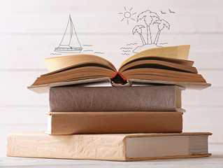 Stack of books and vector icons with light background