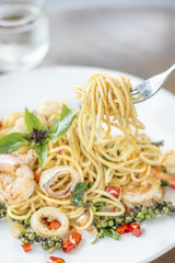 spaghetti seafood with spices, herbs of Thailand delicious food hot and spicy Thai as Italian mix style.