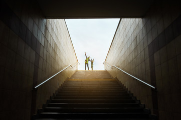 mother and son climbing stairs  - Powered by Adobe