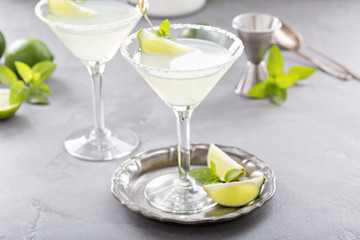 Lemonade martini cocktail garnished with lime