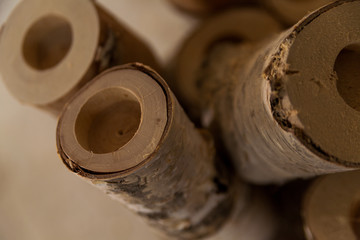 perforated logs in joinery workshop