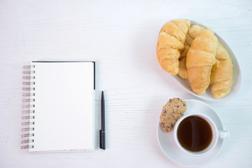 croissant cup coffee white  table top view