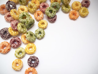 Colorful fruit flavored cereal with space for putting text, selective focus