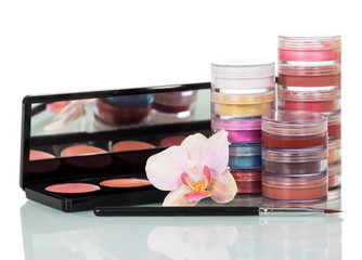 Set  cosmetics and brush for makeup isolated on white background.