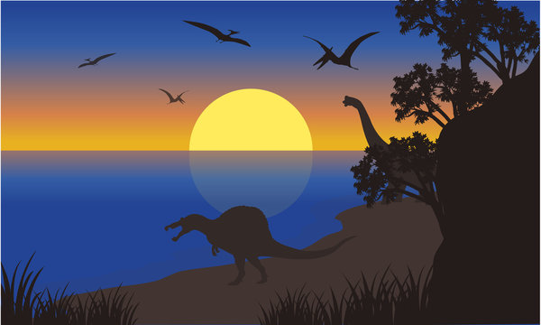 Silhouette of spinosaurus and pterodactyl