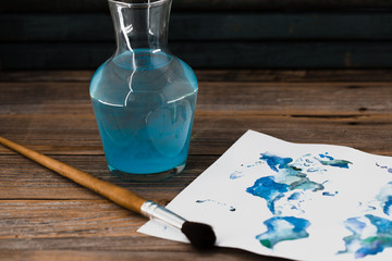 artist tools, paper with blue paint