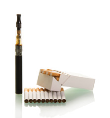 Pack of regular cigarettes and e isolated on white background.