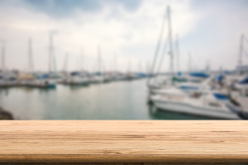 wooden pier with yacht