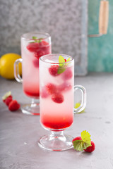 Pink raspberry lemonade in tall glasses