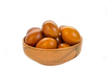 Red and orange easter eggs in a plate