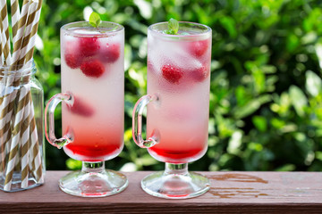 Pink raspberry lemonade in tall glasses