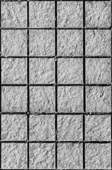 gray stone tiles background and texture in black and white