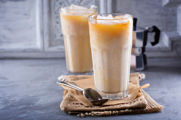 Iced coffee with milk in tall glasses