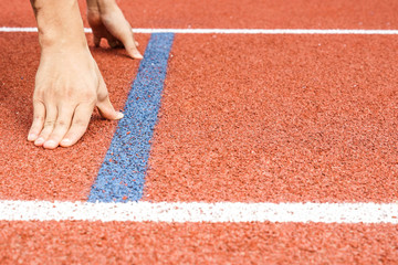 Athlete at the starting point ready to run