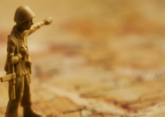 Soldier commanding on mapped territory