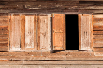 Obraz na płótnie Canvas Windows made of old wood on wooden wall