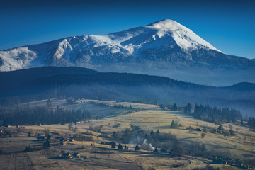 Morning in a Carpathian village on a mountain hill