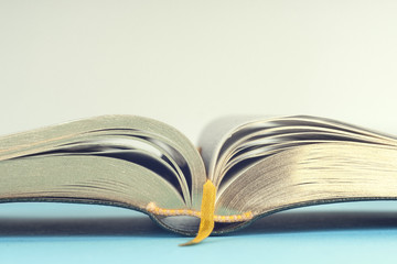 Open book on light table. Back to school. Copy space